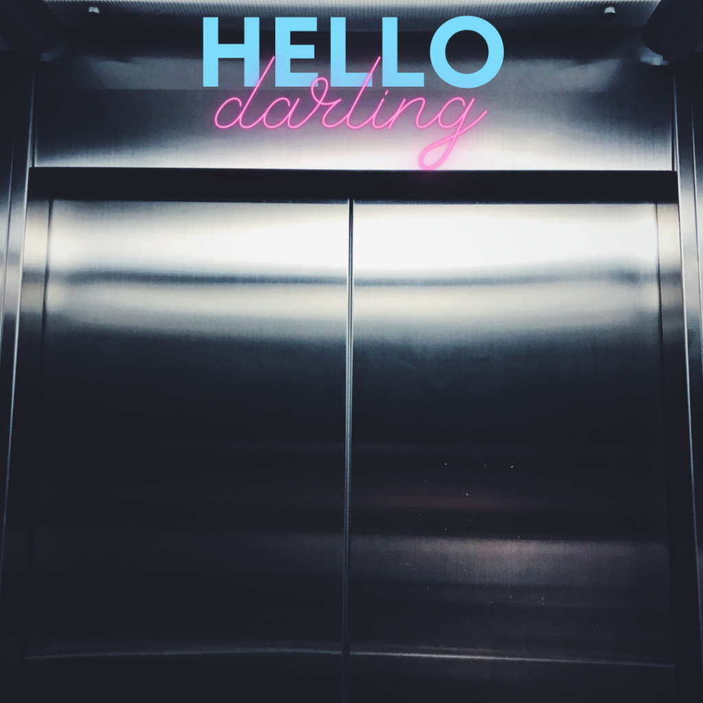 Elevator with sign. "Hello Darling"