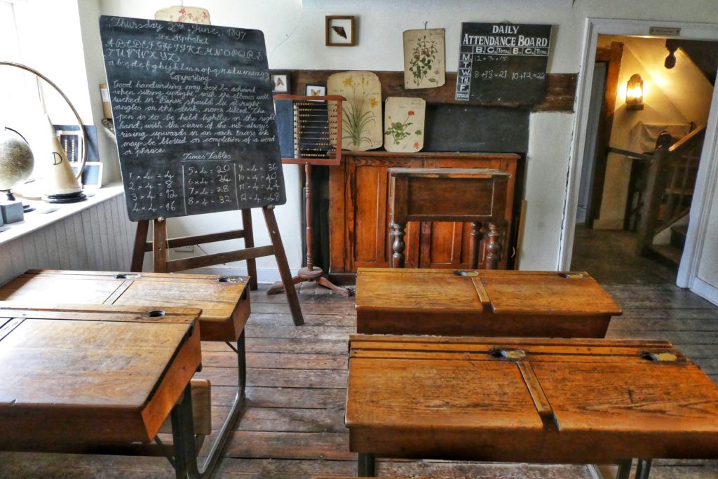 An image of an old timey classroom to emphasize the importance of teaching mini writing classes.
