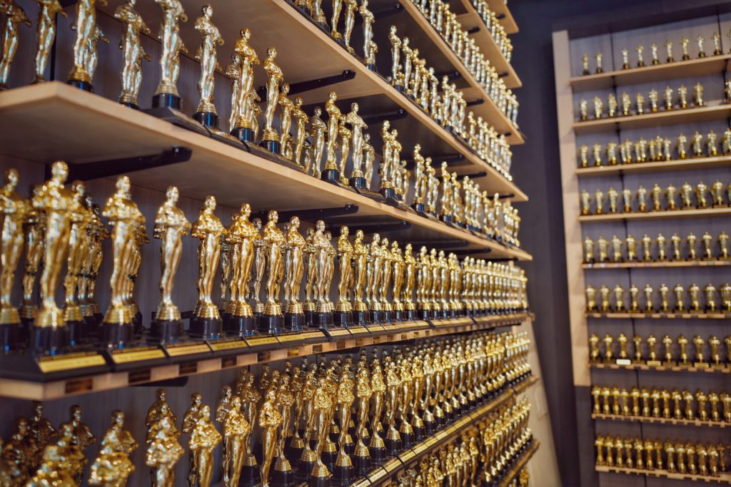 Rows of trophies to emphasize the importance of submitting to contests over and over because eventually, you'll win.